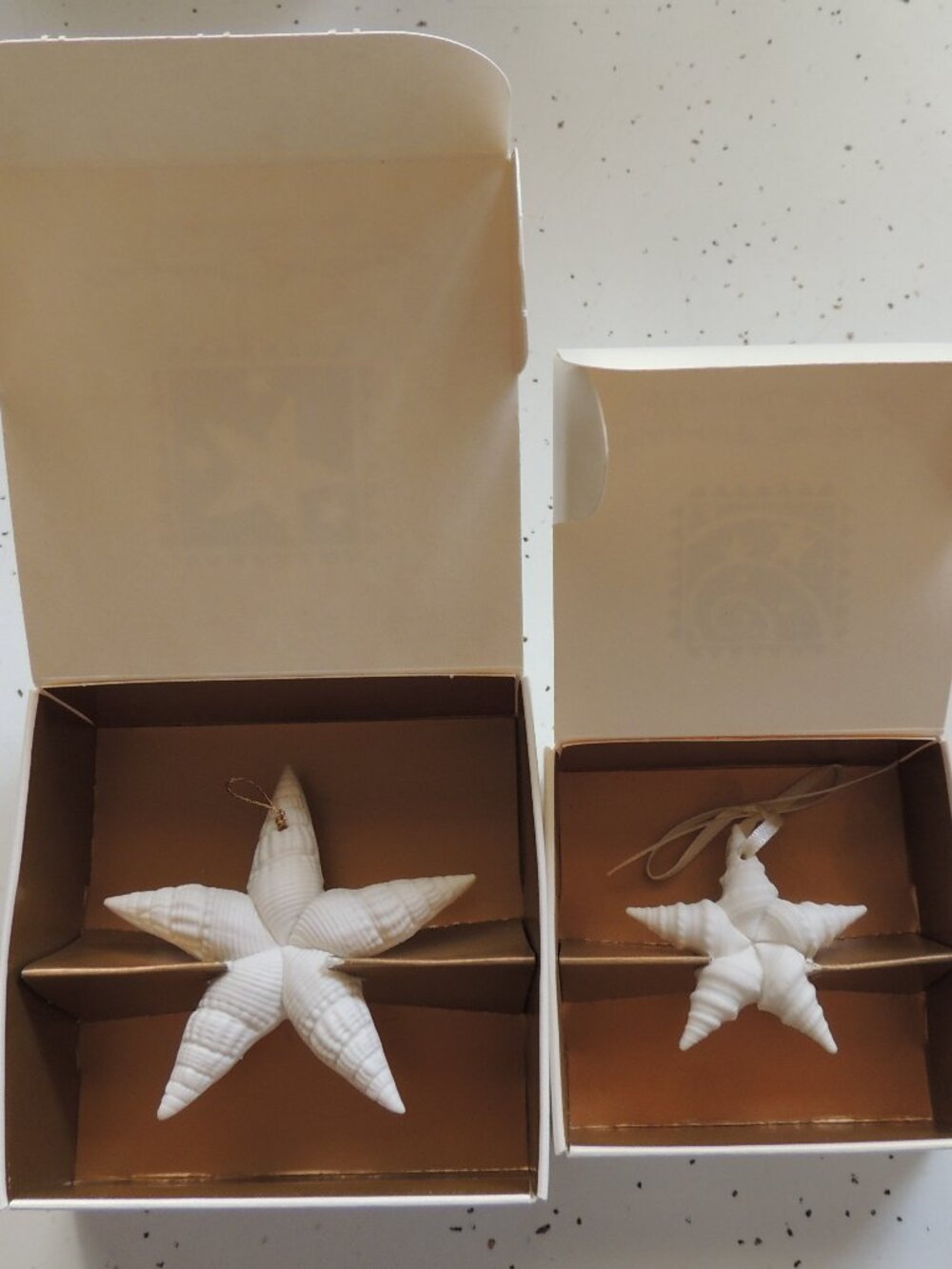 TWO Margaret Furlong star ornaments